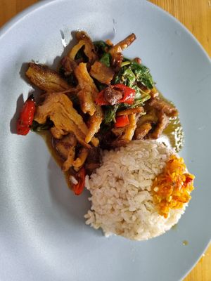 Aroi maak food at Vegie House. Delicious fake duck and lots of chili. Cheap and fast and tasty. Lovely owners. at Vegie House in Bangkok