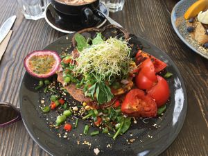 Corn fritters with extra sides of tomatoes and mushrooms at Blendlove in Southport