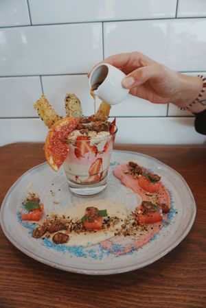 The deconstructed parfait! Coconut yogurt and cashew cream - obsessed with their caramelised almonds! at Blendlove in Southport