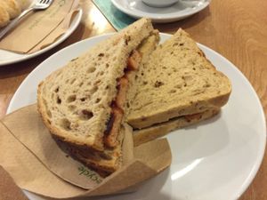 Vegan Sausage Sandwich at Cafe Mbriki in Leicester