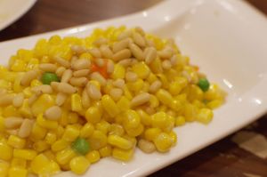 Sauteed corn with pine nuts and goji berries at Shandong Mama in Melbourne