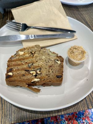 Vegan banana bread with almond butter. I had set my expectations low for this one as it looked “healthy” but it was actually really good, especially with the almond butter.  at Helen's Heavenly Bulk Foods in Burleigh Heads