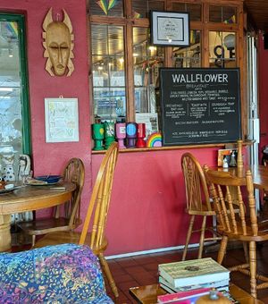 Breakfast menu and award at The Wallflower Cafe in Herne Bay