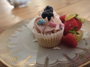 Rainbow unicorns on tiny vanilla cupcakes at Cafe Herzstück in Goerlitz