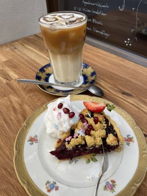 Blueberry crumble cake and iced oat latte  at Cafe Herzstück in Goerlitz