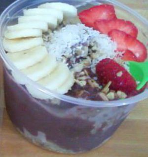 Key West Acai Bowl 
(blended frozen acai, pineapple, mango, papaya and coconut milk. And topped with granola, strawberries, bananas and coconut flakes.) at The Bowl - Pine Ridge Rd in Naples