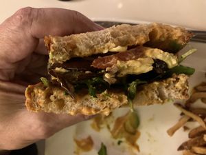 Nom nom!  Smoky eggplant sandwich.  Order it now! at The Coronado PHX in Phoenix