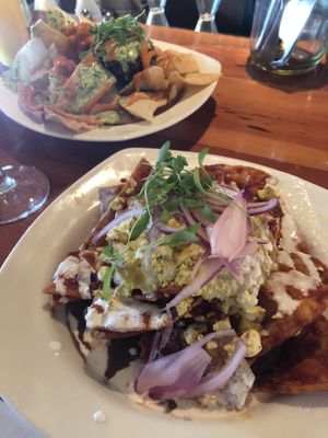 Chilaquiles (in front) fried guacamole (back)  at The Coronado PHX in Phoenix