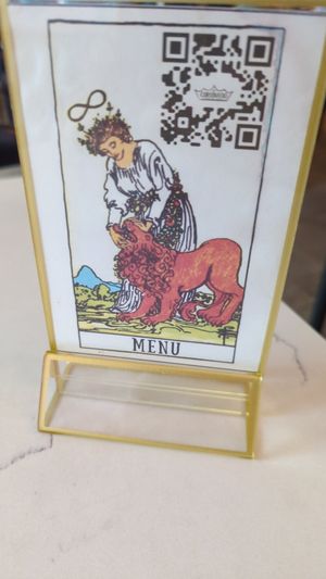 Tarot themed menu placard. This one is VIII/Strength. at The Coronado PHX in Phoenix