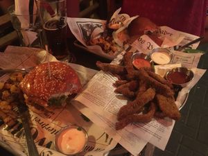 Vegan nuggets on the right, cheeseburger on the left  at Shuffle Pub in Tel Aviv