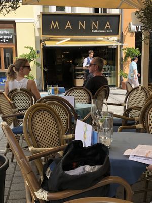 Outdoor seating in the square   at Manna in Innsbruck