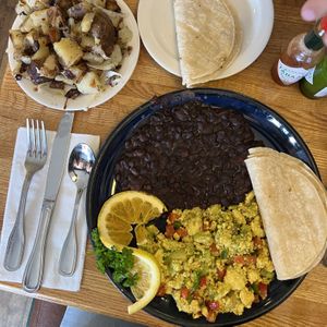 huevos mexicanos with no cheese, tofu instead of eggs, side of potatoes, and extra corn tortillas  at Walnut Avenue Cafe in Santa Cruz