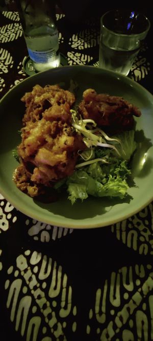 Entrée: patties with homemade peanut sauce and salad at Cafe Bali in Saarbrucken