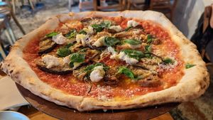 The melazanne add impossible sausage at Gigi Pizzeria in Newtown