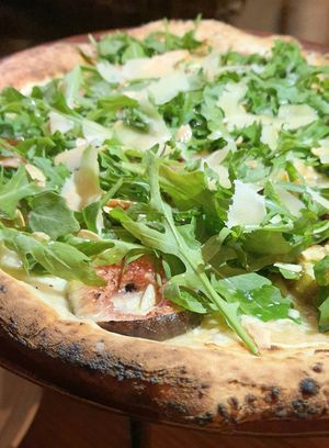 pizza with figs and aragula - close-up at Gigi Pizzeria in Newtown