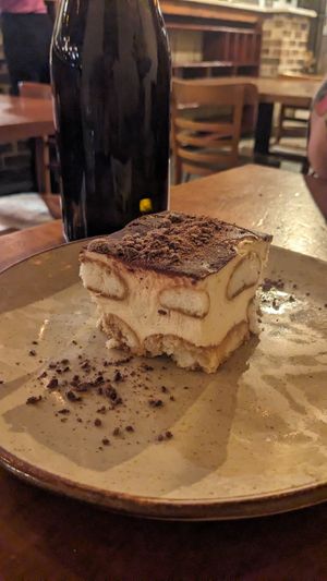 $14 tiramisu slice. It is not big. It is not $14 worthy 😭 at Gigi Pizzeria in Newtown