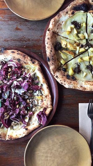 Blue cheese and walnut + potato and truffle  at Gigi Pizzeria in Newtown