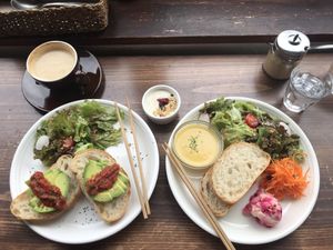 Avocado toast, breakfast plate and soy latté at Veg Out in Kyoto