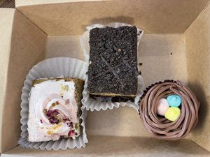 Pistachio bar, death bar, chocolate cupcake with Easter eggs.   at Valhalla Bakery in Orlando