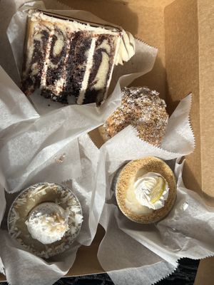 Mini coconut cream & key lime pies, coffee cake muffin, marble cake  at Valhalla Bakery in Orlando