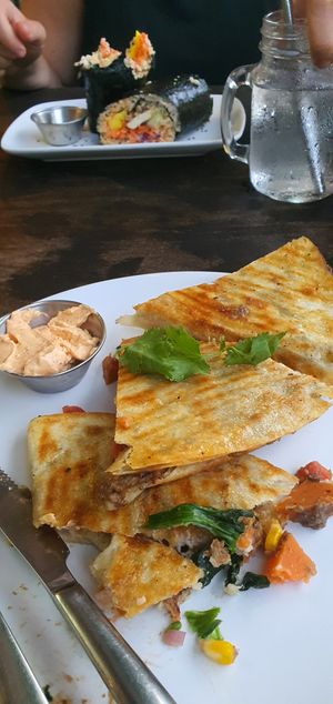 The sextant quesedillas and the sushi burrito at the back at VegetaBowl in Koh Tao