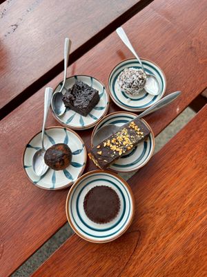 All of their vegan desserts: snickers, peanut butter, cup, truffles, brownie at VegetaBowl in Koh Tao