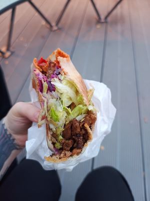 Gyro with a few bites taken out of it at Vegan Gyros - Mauer Park - Food Truck in Berlin