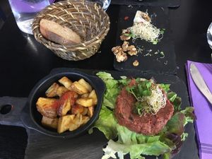 Tartar, potatoes, bread. Really nice flavors! at Velicious in Strasbourg
