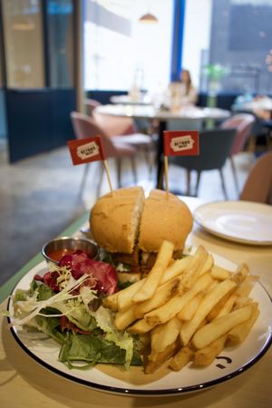 Delicious Beyond Meat Burger. The fries were a bit basic and needed some extra salt in our opinion, but the burger made this meal more than worth it. at Green Common Kind Kitchen - Nan Fung Place in Hong Kong Island