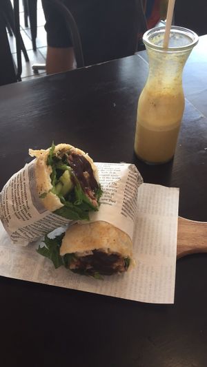 Sweet potato dosa wrap and iced turmeric latte   at Nalinis Wholesome Streetfood - Bondi Junction in Bondi Junction