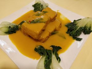 Tofu with pumpkin sauce at Supreme Vege 善心缘 - Bras Basah in Central Singapore