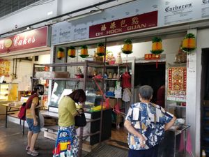 Street View during Covid-19 Circuit Breaker period. Customers wearing masks, face shield and observing Social distancing at Oh Hock Guan 福源素食包点 in Central Singapore