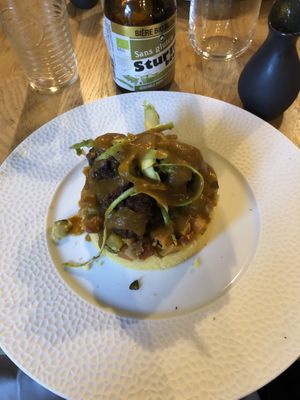 Couscous with delicious vegetables and a red sauce at Vegan Gorilla in Nice