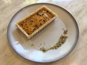 White Chocolate and Passionfruit tart (special) at Serotonin Eatery in Burnley
