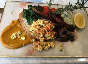 Daily special, tofu scramble with tempeh bacon and pumpkin seed feta at Serotonin Eatery in Burnley