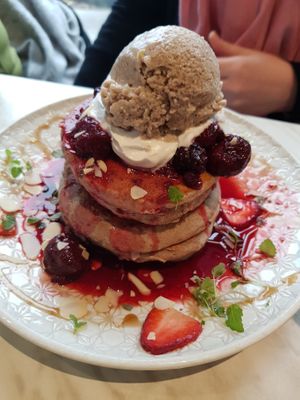 My friend making me re -consider my order at Serotonin Eatery in Burnley