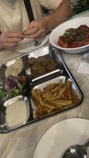 8 piece Falafel (vegan except garlic sauce) & tofu Manchurian curry😄both very delicious, big portions of the curry   at EL Cafe International Vegan Food in Phan Thiet