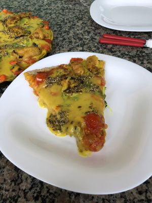 Pizza de queijo de batata, com tomate confit, pimenta biquinho e berinjela empanada  at Cozinha Divina in Olinda