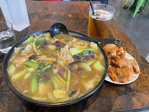 Mushroom noodle soup, suji and plum juice  at Vegeme in South Brisbane