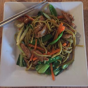 Vegan spinach noodles with vegetables  at Green Elephant Vegetarian Bistro & Bar in Portsmouth