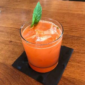 Drink special whiskey Campari lemon carrot- surprisingly delish! at Green Elephant Vegetarian Bistro & Bar in Portsmouth