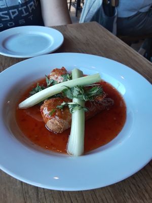 Hot and Spicy "Chicken" Skewers.  Faux chicken on a skewer bone with a crisp skin and covered in sweet chili sauce. A+ at Green Elephant Vegetarian Bistro & Bar in Portsmouth