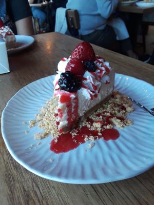 Vegan Cheesecake with berries. Not as tangy as the real thing but it is incredibly delicious. And no, it didn't taste like lemony cashews. Wicked good.  at Green Elephant Vegetarian Bistro & Bar in Portsmouth
