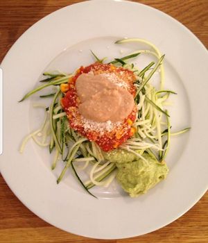 Zucchini Noodles with fresh tomato and peanut sauce and a spladh of avocado  at s'Teeblatt in St Gallen