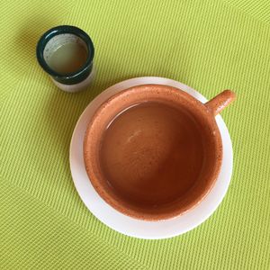 Ginger shot and herbal tea at Green Food Service in Oranjestad