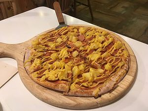 Delicious Hawaiian pizza at Cloud Kitchen in Beijing