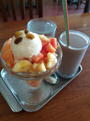 Fruit Salad with icecream and a glass of soy milk at Soya Food Centre at Soya Food Centre in Anuradhapura