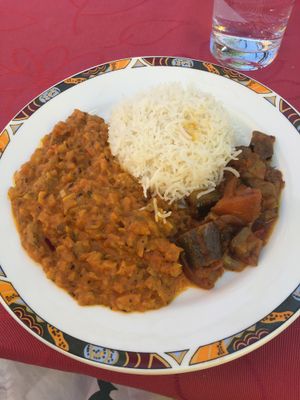 Vegan roasted aubergine with tomatoes, onions and rice at Ganges in Loerrach