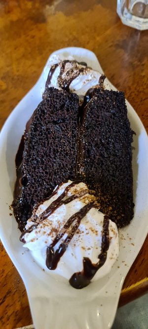 Vegan chocolate fudge cake with vegan cream at Pimento Tea Rooms in Lincoln