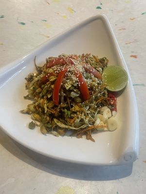 Must try: fermented tea leaf salad (Myanmar speciality)  at Broccoli Revolution - Sukhumvit Rd in Bangkok